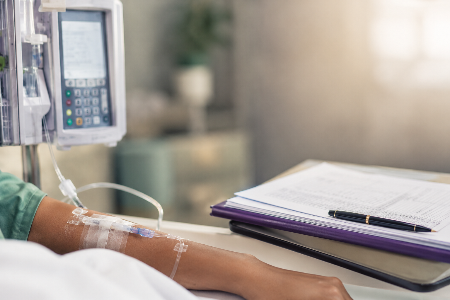 Infusion therapy setup beside a clinical chart representing treatment monitoring and documentation